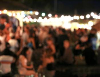 blurry visual of a night market or festival