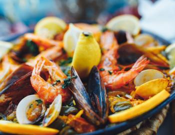 seafood dinner with shrimp, clams, and more