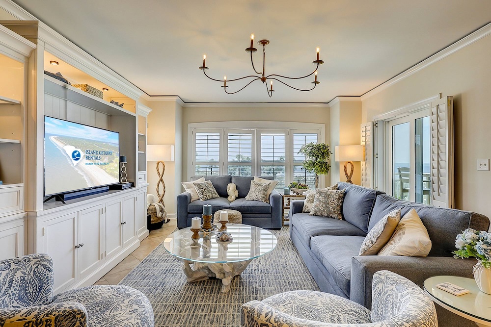 Vacation rental interior with ocean view in background